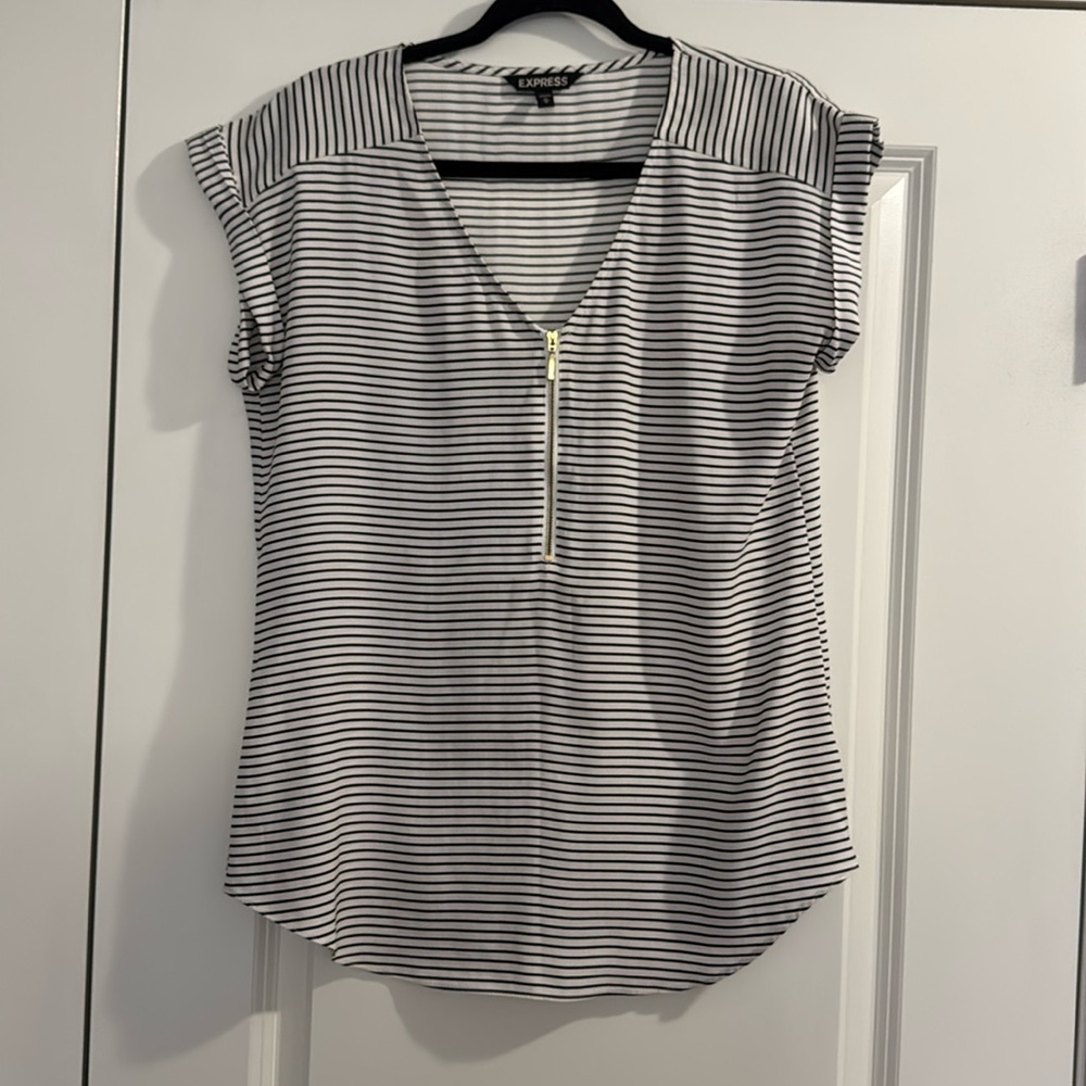 Express blouse; M; good condition; black and white with a gold zipper